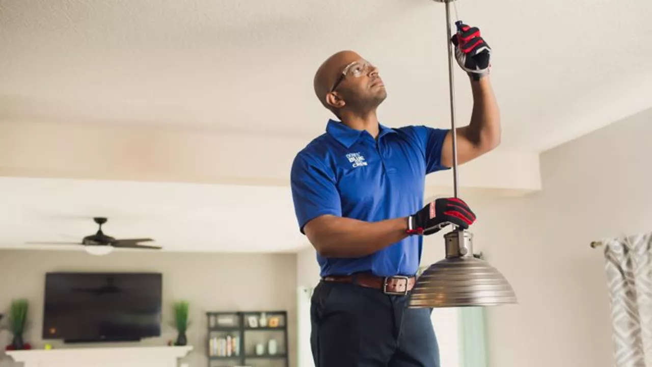 How much does a handyman charge to install a light fixture?